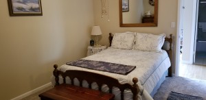 cozy double bed with nightstand