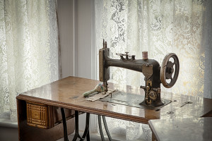 Antique Sewing Machine on wood table in home